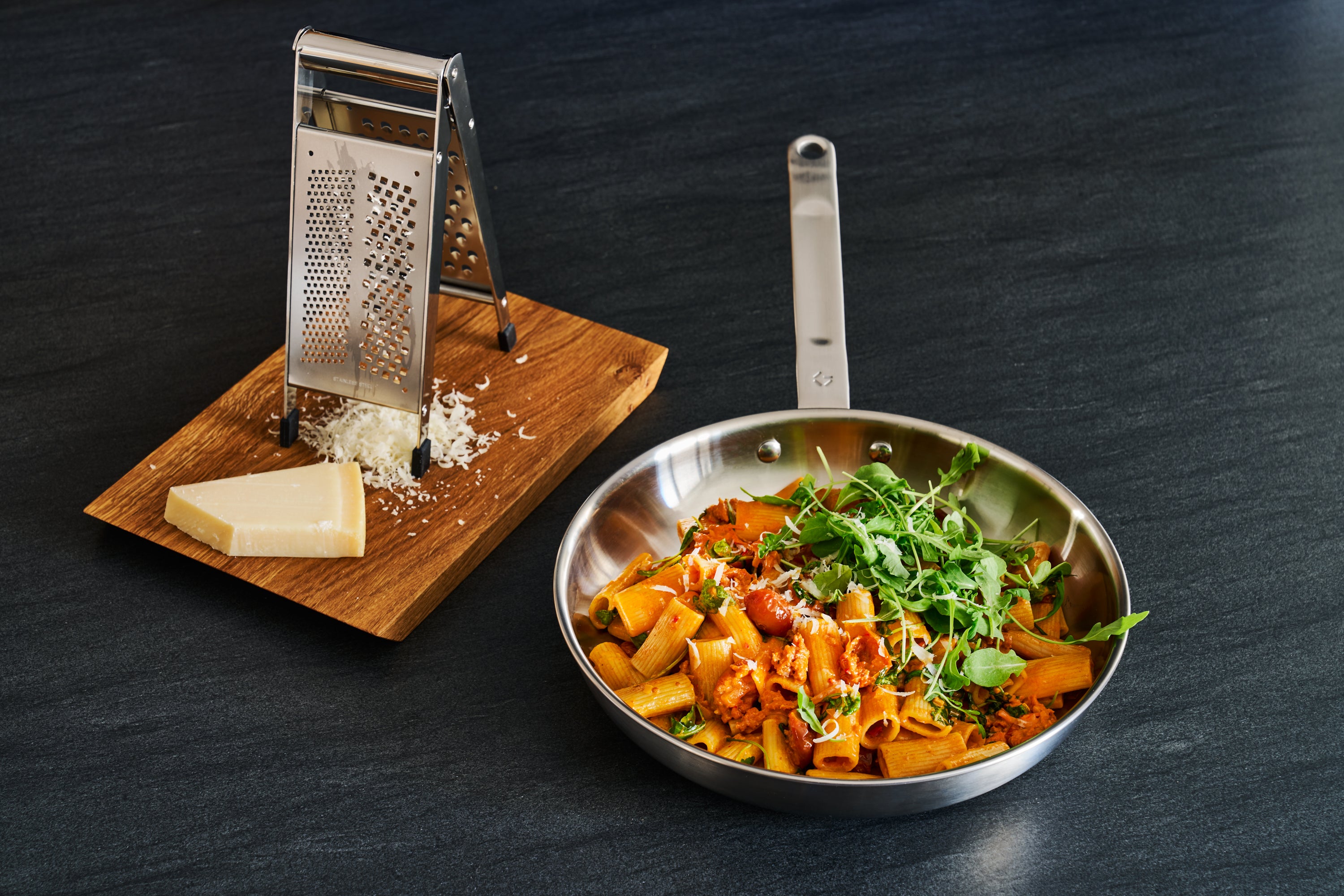 Pasta with chorizo, semi-dried tomatoes and arugula